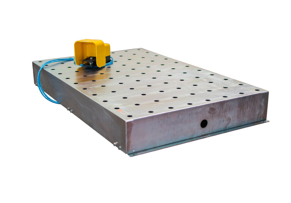 Modular table with pneumatically retractable ball transfers