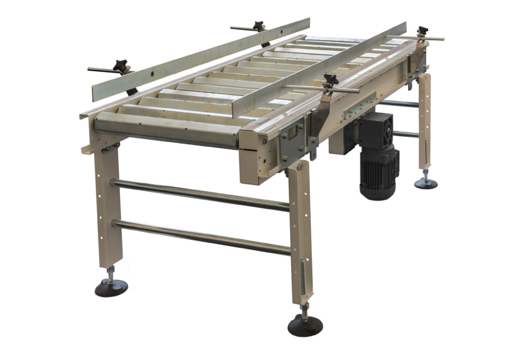 Motorized conveyor with hexagonal rollers for compacting small parts